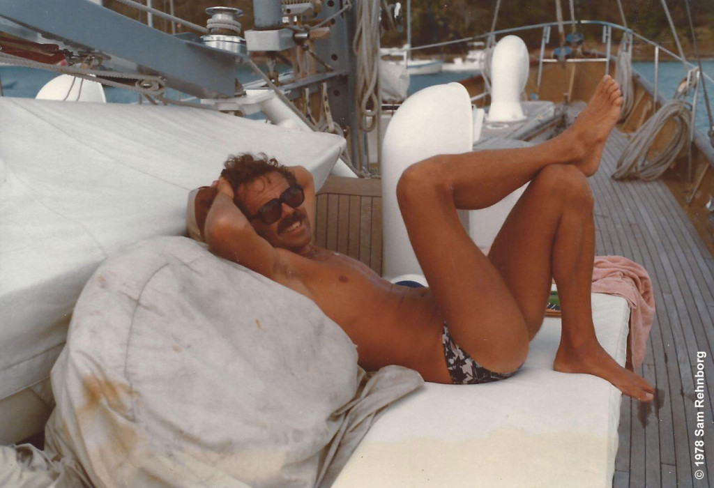 Kicking back on a sunny day aboard the Firebird in typical attire: sunglasses, bare feet and swimsuit, Grenadines, 1978.