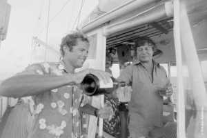 Celebrating a successful 3-year voyage with Captain Bob (right) and the rest of the Firebird crew, 1978.