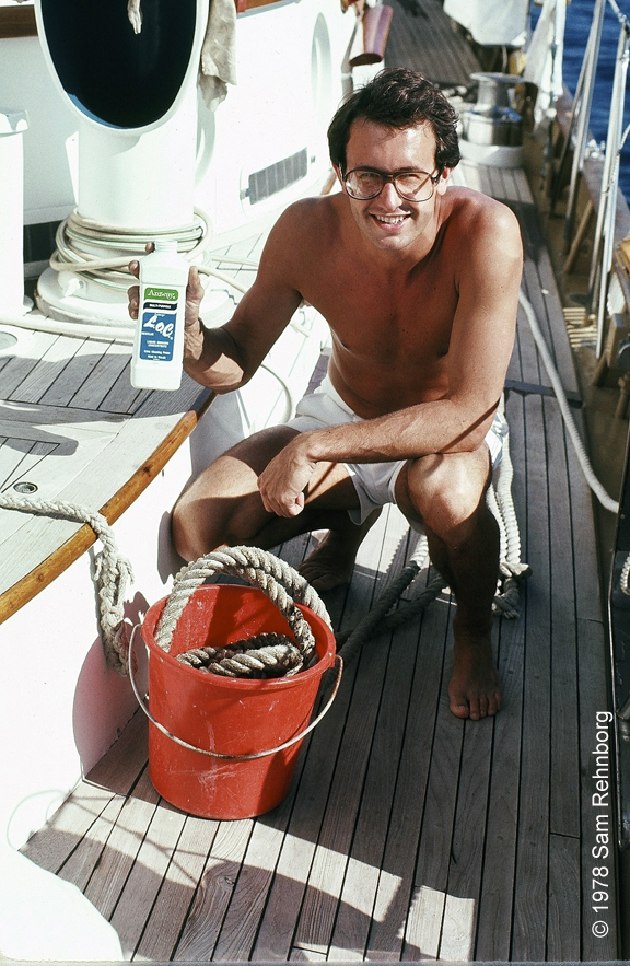 Dick DeVos washing the dock lines. Amway L.O.C.® comes in very useful. Puerto Rico de Gran Canaria, Canary Islands, Spain, January 1978.