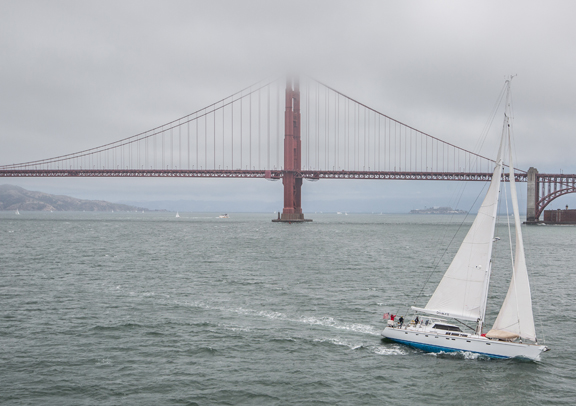 The Double X sails under the Golden Gate Bridge on departure day with winds blowing at 20-25 knots, making for an exciting beginning to our journey to the South Seas. San Francisco, Calif., July 16, 2016. Photo: C. Woods