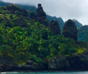 Rock formations soar into the sky from the lush vegetation below. This was the view from our first anchorage in Fatu Hiva, Marquesas Islands. August 2016. Photo: F. Rehnborg