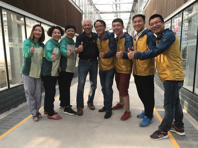 The ABO group join me as we lean in to give the camera a smile and thumbs up, marking the end of a great tour of the Amway Botanical research Center . Wuxi, China. July 15, 2017.