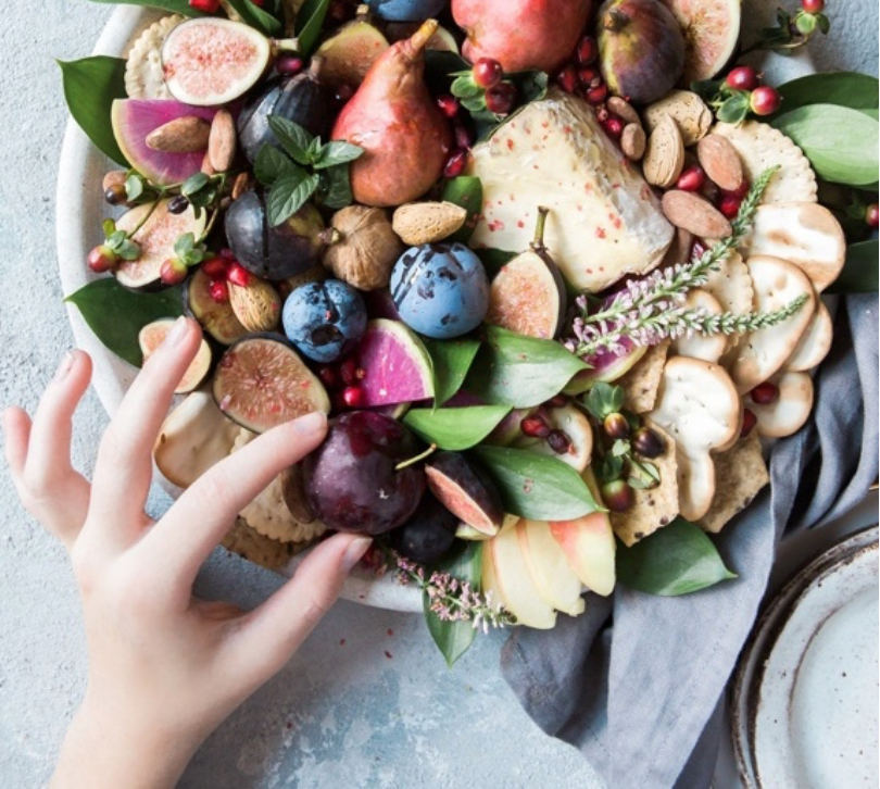 A bowlful of assorted fruits, nuts, seeds and other foods. When you choose a diet that is primarily plant-based, your reward is powerful benefits that extend well beyond disease prevention. Photo: Brooke Lark