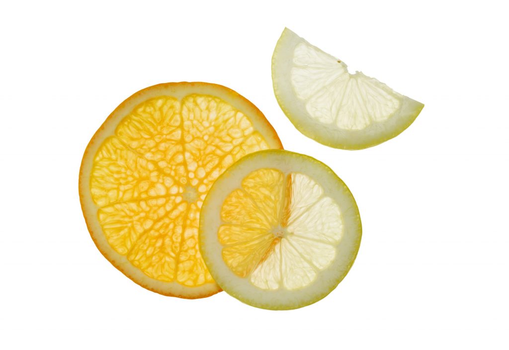 Slices of orange and lemon. All citrus fruits—oranges, lemons, limes, grapefruits and more—are a rich source of vitamin C.