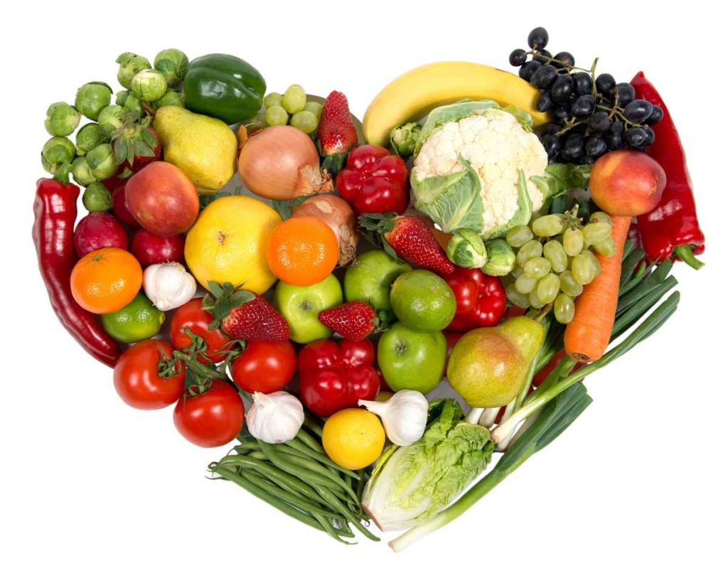 An assortment of colorful fruits and vegetables formed into the shape of a heart. Your heart works nonstop pumping about 1,500 to 2,000 gallons of blood through your body daily. In order to do its job optimally, your heart needs proper nourishment.