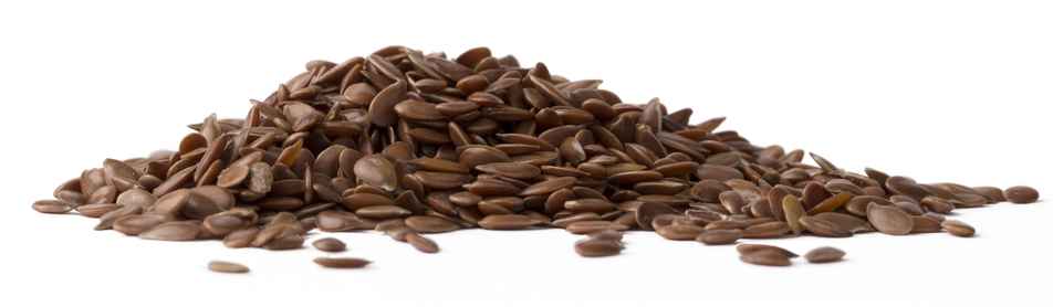 A pile of flaxseeds. These tiny seeds are a rich source of ALA omega-3 fat made more bioavailable with proper processing.